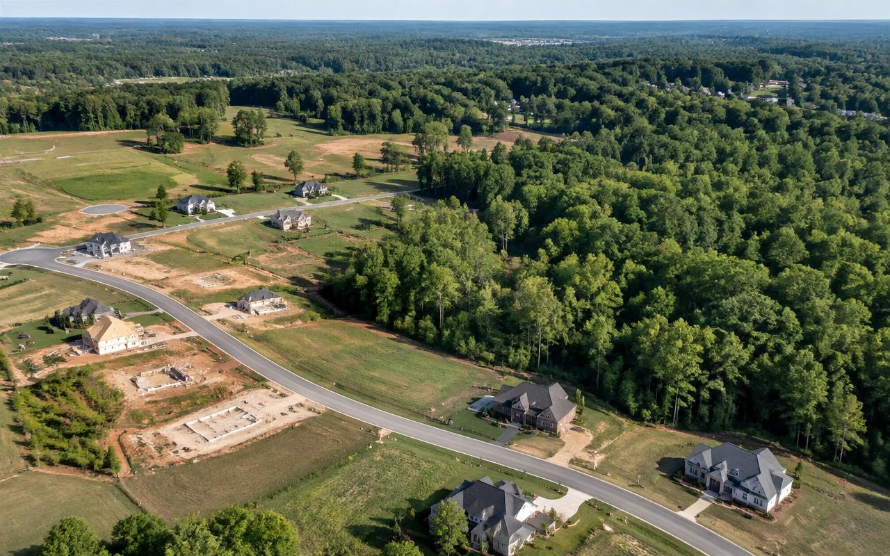 Aerial perspective of land and residential growth in Weddington